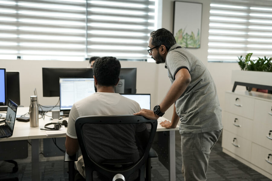 NKORR engineers reviewing code